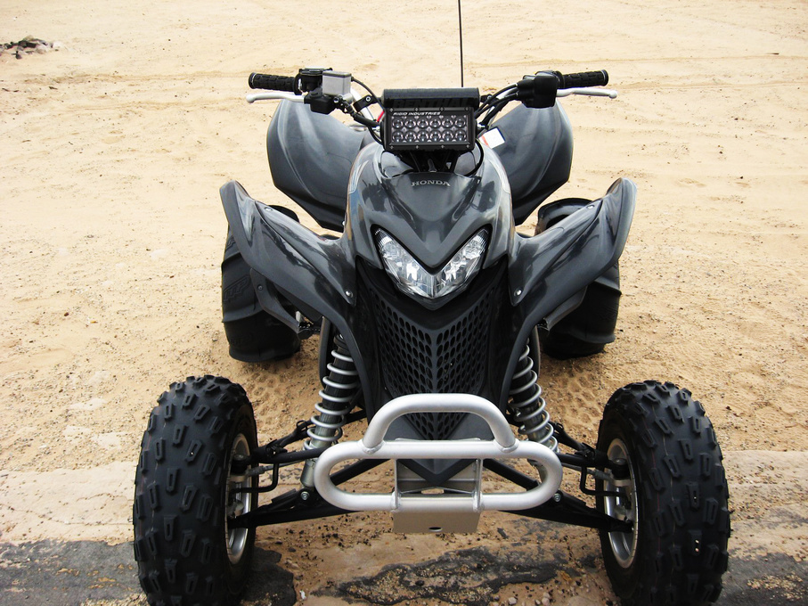 | Black ATV Reppin' a Rigid Handle Bar Mount & E-Series Light Bar!