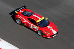 Ariel view of the 63 car with their sleek Continental Tires carrying them through the course