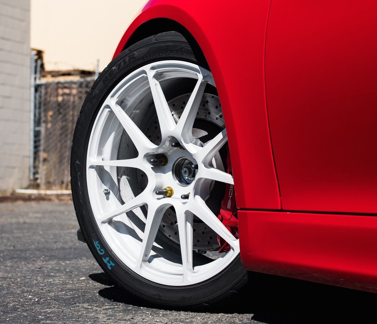2016 Porsche Cayman | SP Motorsports' Porsche Cayman GT4 Shop Car on Forgeline One Piece Forged Monoblock GA1R Open Lug Wheels