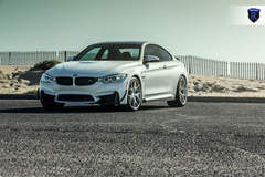 BMW M4 - White Driver Side Front Angle