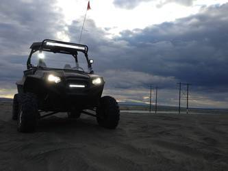 All-Black Polaris RZR with Rigid lights