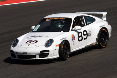 Style, precision and speed are what makes up the 89 Porsche, maneuvering the COTA track on their Continental Tires.