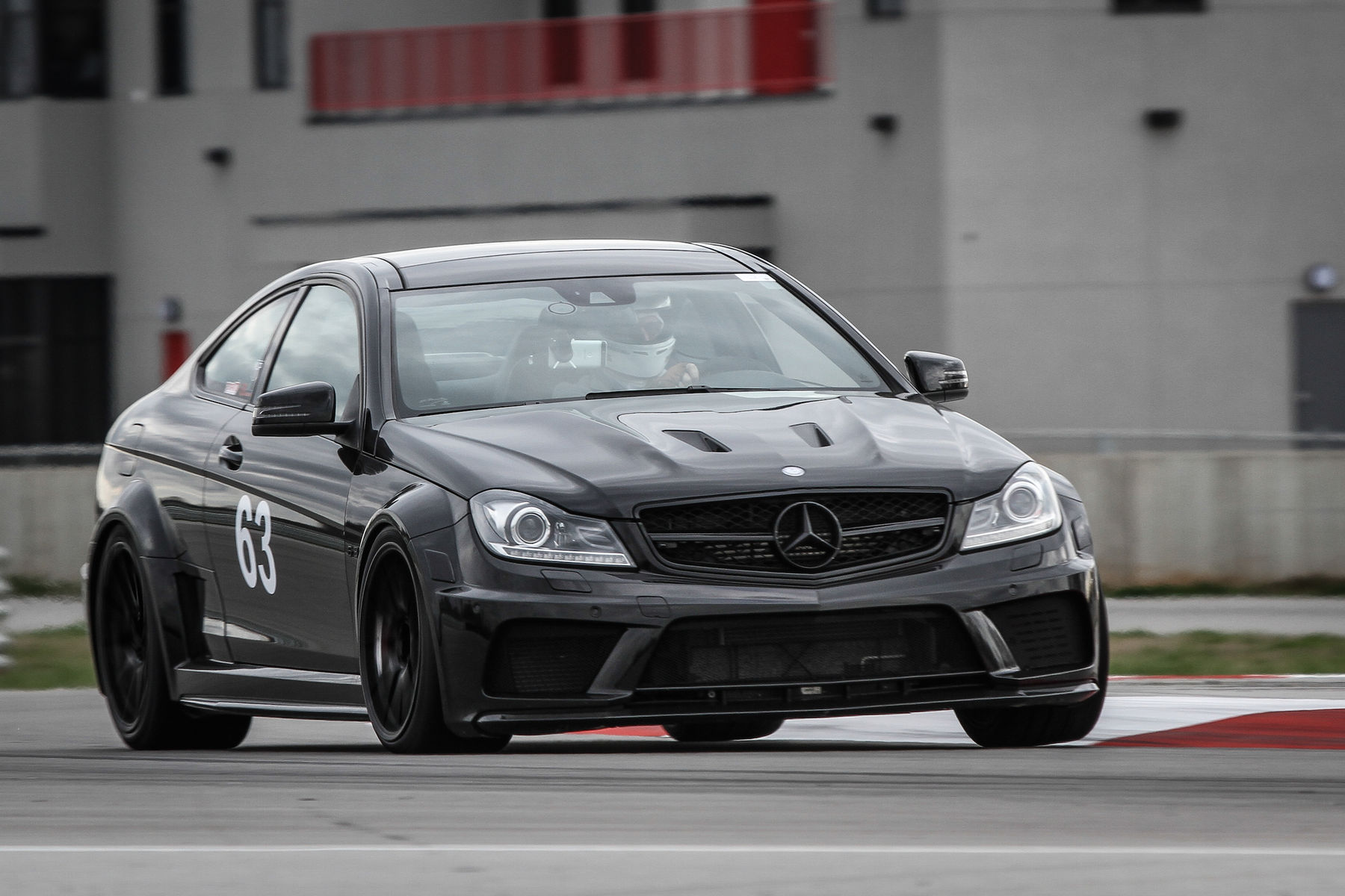 2014 Mercedes-Benz C63 AMG | Bernhard Weber's Mercedes AMG C63 Coupe on Forgeline One Piece Forged Monoblock GA1R Open Lug Cap Edition Wheels