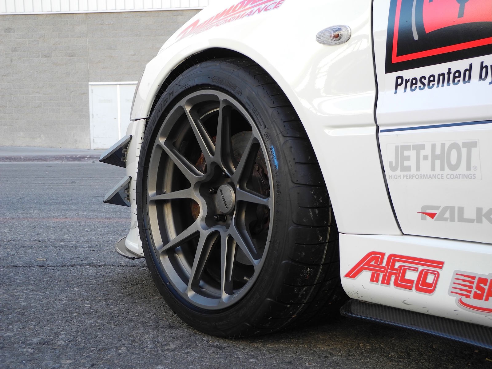 2006 Mitsubishi Lancer Evolution | Showtime Motorsports Evo on Forgeline GA1R Open Lug Wheels - Close Up Wheel Shot