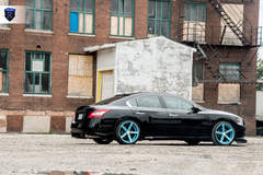Black Nissan Maxima - Side Wheel Shot