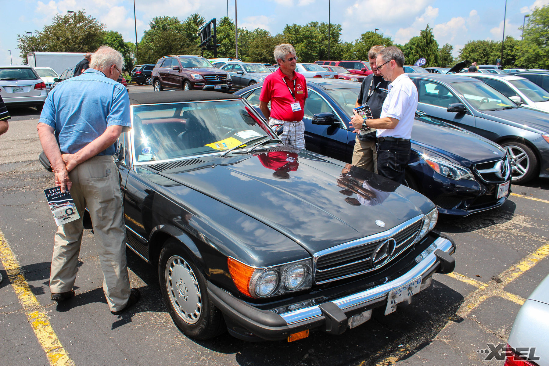Mercedes-Benz | Admiring the reflection of the paint for this older Mercedes