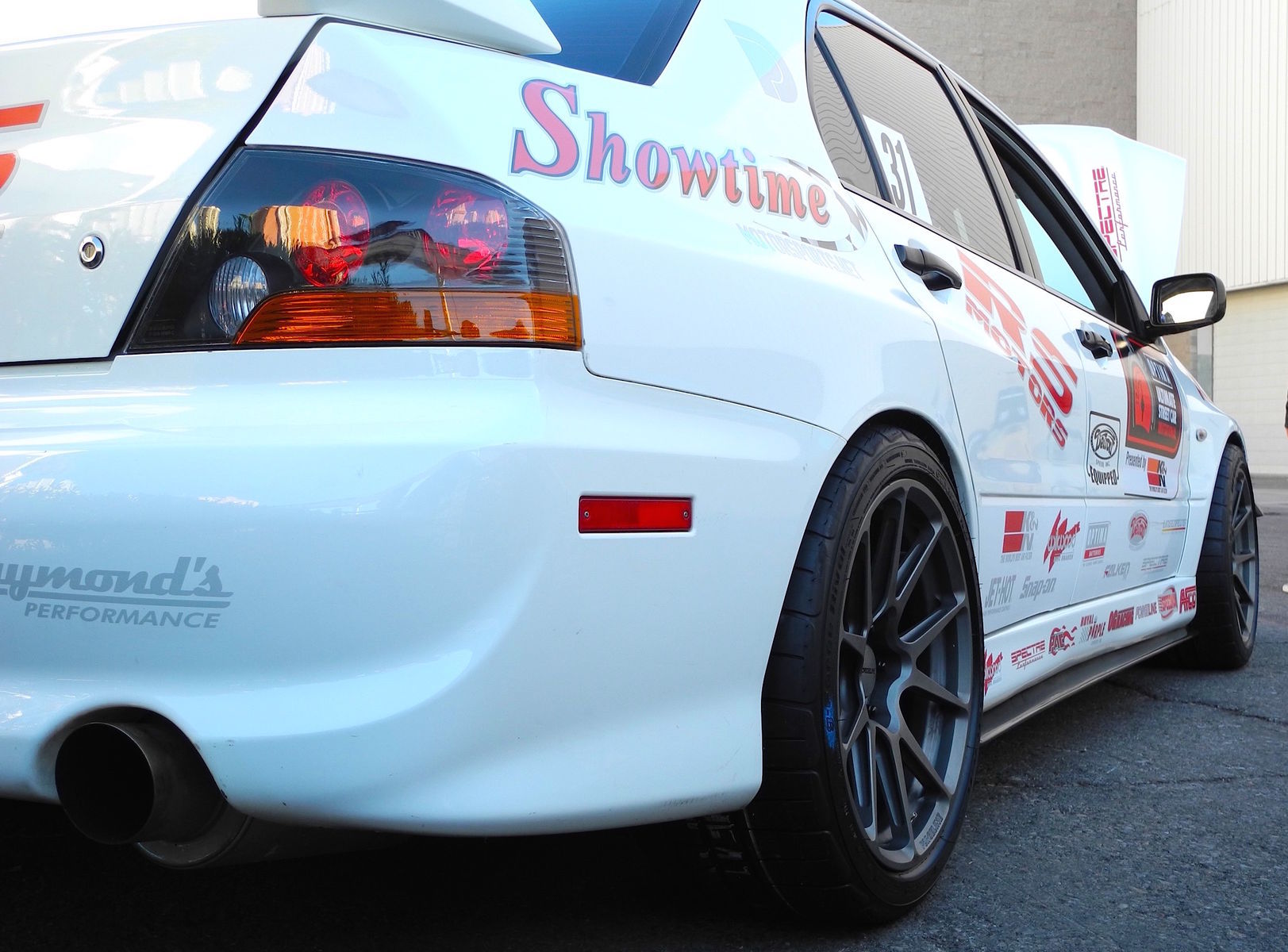 2006 Mitsubishi Lancer Evolution | Showtime Motorsports Evo on Forgeline GA1R Open Lug Wheels - Low Wheel View