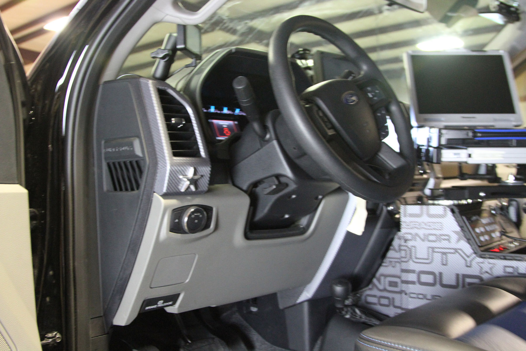 2017 Ford F-350 Super Duty | 2017 Ford F-350 Super Duty 4x4 XL Crew Cab “MBX350 Matchbox Police” by Skyjacker Suspensions - Laptop in dash