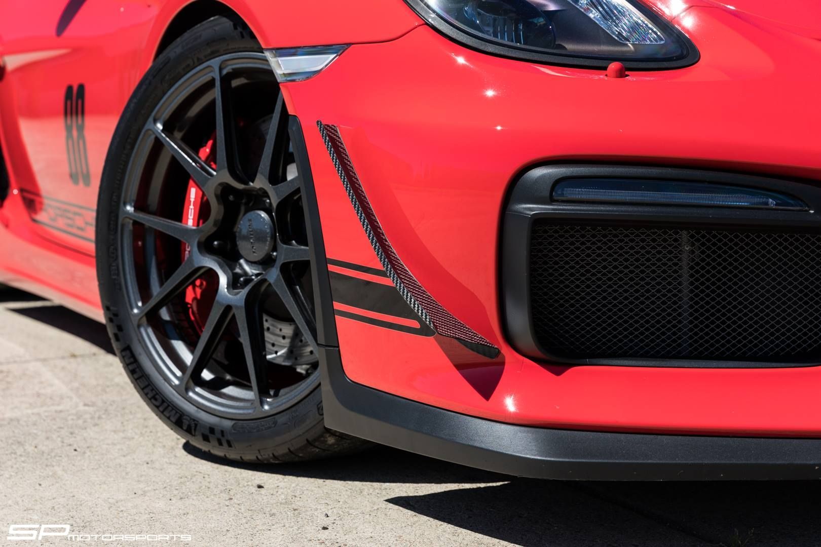 2016 Porsche Cayman | Steve's SP Motorsports Guards Red Porsche Cayman GT4 on Forgeline One Piece Forged Monoblock GA1R Open Lug Wheels