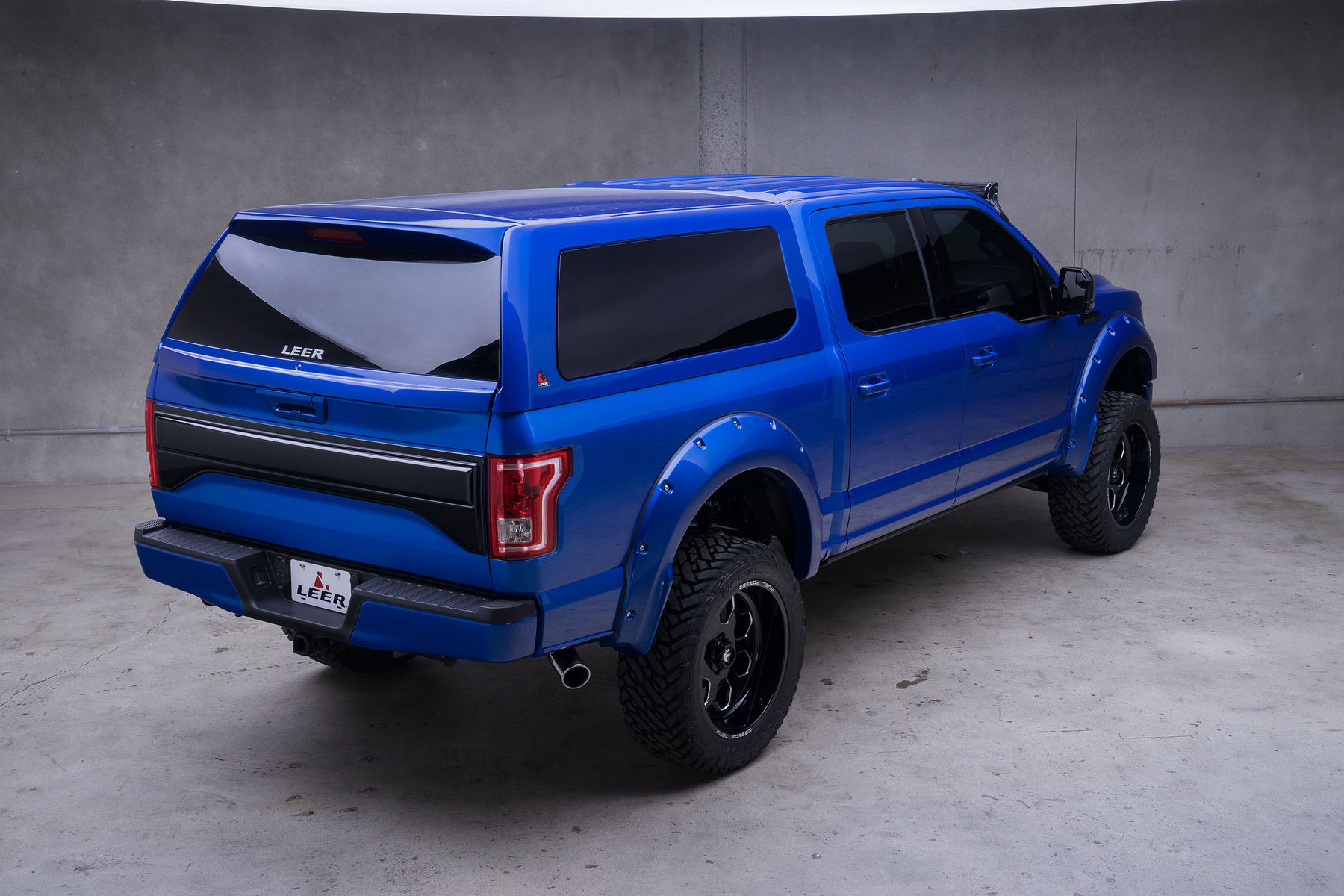 2015 Ford F-150 | '15 Ford F-150 CrewCab by Leer - Rear Angled Shot