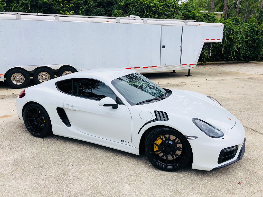2018 Porsche Cayman | BGB Motorsports White Rhino Porsche Cayman on Forgeline One Piece Forged Monoblock GA1R Open Lug Wheels