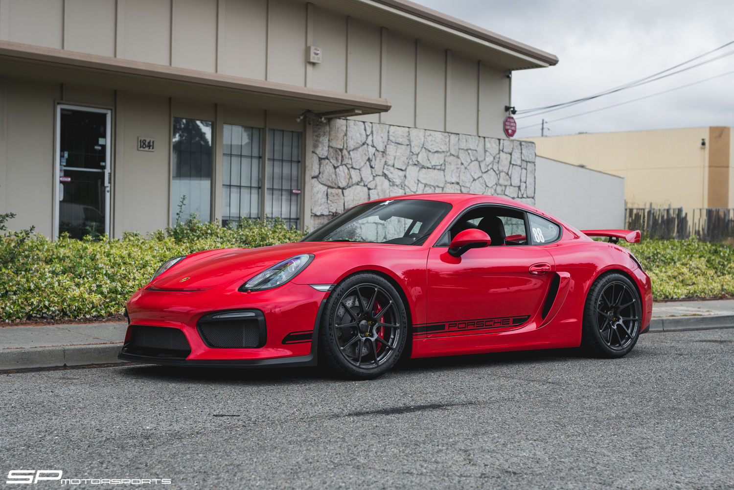 2016 Porsche Cayman | Steve’s Guards Red Porsche Cayman GT4 on Forgeline One Piece Forged Monoblock GA1R Open Lug Cap Edition Wheels