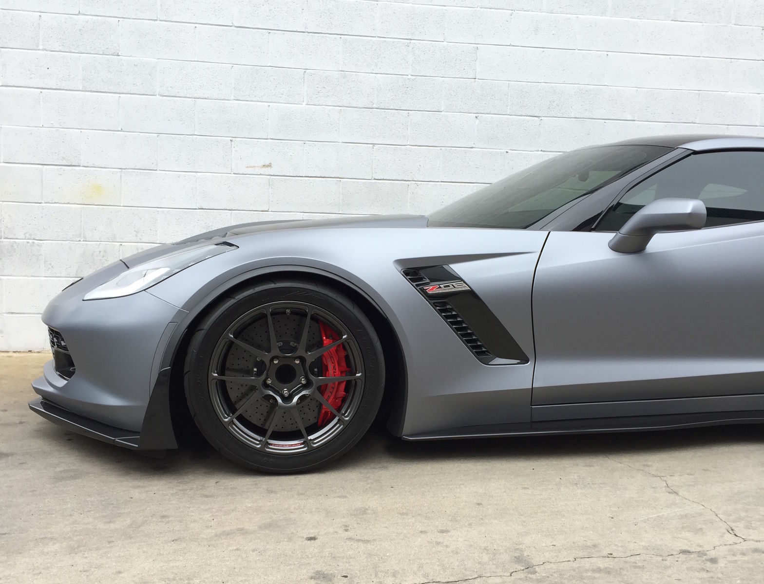 2016 Chevrolet Corvette Z06 | Wrapped C7 Corvette Z06 on Forgeline One Piece Forged Monoblock GA1R Open Lug Wheels from R1 Motorsport