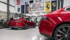 Two Red Tesla Model S with XPEL Clear Bra
