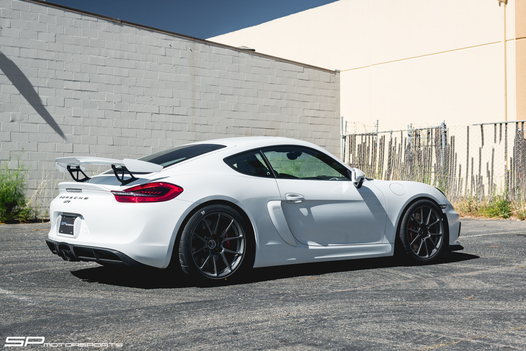 White Porsche Cayman GT4 by SP Motorsports on One Piece