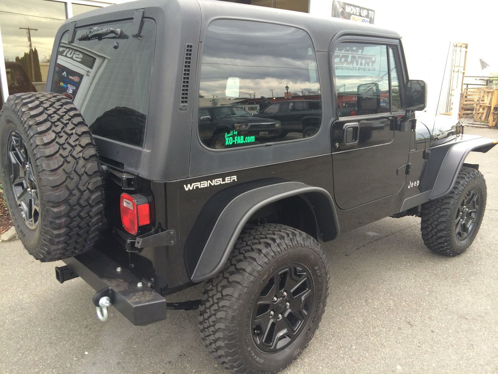 1990 Jeep Wrangler | '90 YJ Jeep with lift, wheels, and custom bumper and fenders