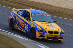 Turner Motorsports adequately entering the turn at Barber Motorsports Park and testing the limit of their Continental Tires.  