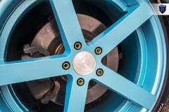 Black Nissan Maxima - Blue Spokes