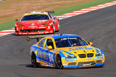 Keeping the competition behind him as he charges into the next turn. The grip is all thanks to their Continental Tires
