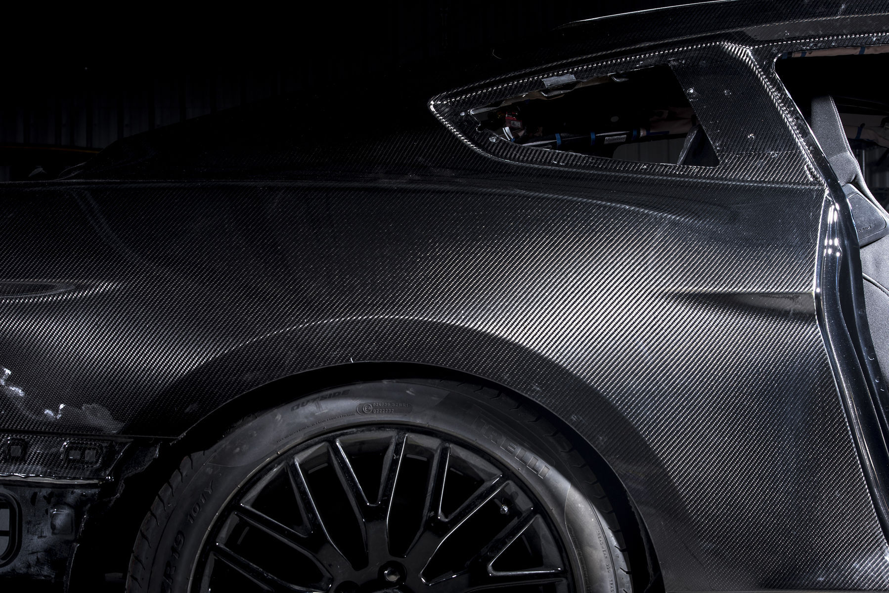 2017 Ford Mustang | 2017 Ford Mustang Fastback by SpeedKore Performance Group - Carbon Fiber rear quarter